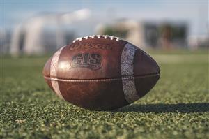 A football sitting on field